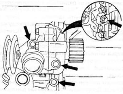 Рис. 124. Завинчивание водяного насоса дизельного двигателя (см. текст).