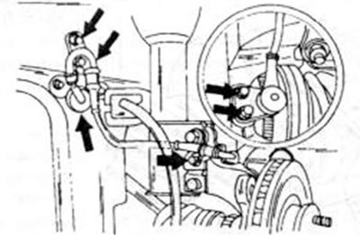 Рис.241. Стрелки указывают на места крепления датчиков скорости передних колес при установленном…