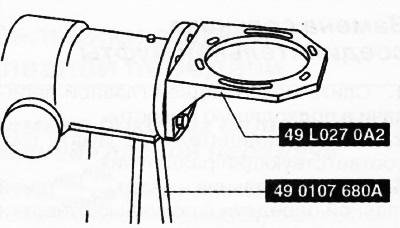 2. Установить специальное приспособление на стенд для двигателя.