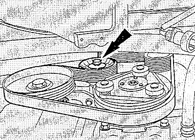 Turn the middle belt tensioner bolt (arrow) with a 15 mm open-end wrench to the right, thereby…