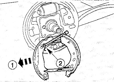 Откинуть тормозные колодки вниз.