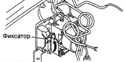1. Lift the retainer and disconnect the connector from the pressure modulator.