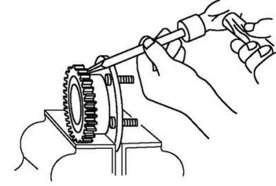 Fig. 3.120. Removing the ABS sensor rotor